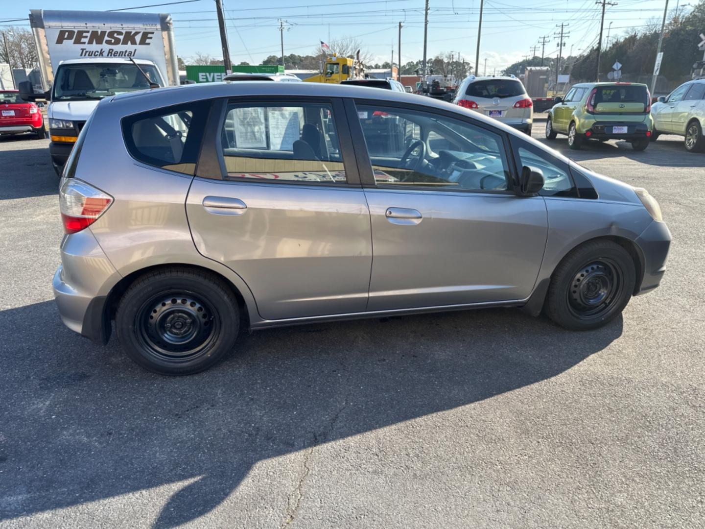 2009 Silver Honda Fit 5-Speed AT (JHMGE88299S) with an 1.5L L4 SOHC 16V engine, 5-Speed Automatic transmission, located at 5700 Curlew Drive, Norfolk, VA, 23502, (757) 455-6330, 36.841885, -76.209412 - Photo#4